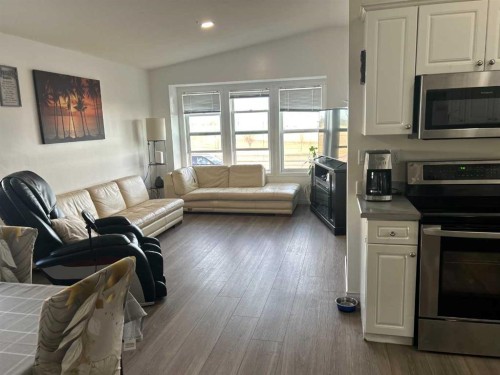 1708 2Nd Avenue East, Brooks, AB - Indoor Photo Showing Living Room