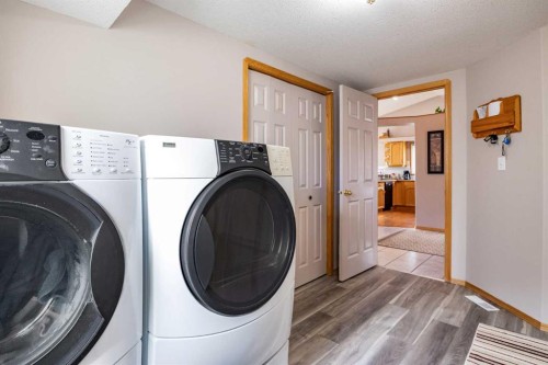 27 Upland Manor, Brooks, AB - Indoor Photo Showing Laundry Room