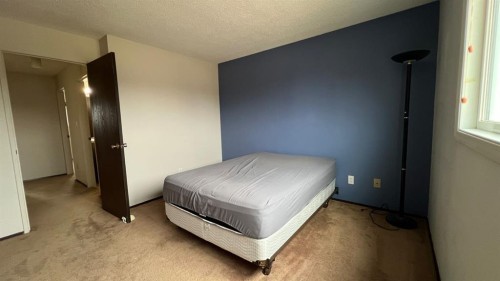 177 Shacker Cres, Hanna, AB - Indoor Photo Showing Bedroom