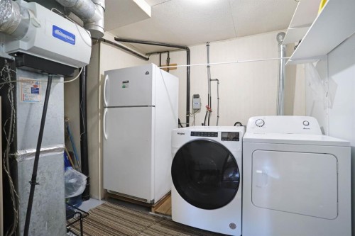 28 Upland Crescent West, Brooks, AB - Indoor Photo Showing Laundry Room