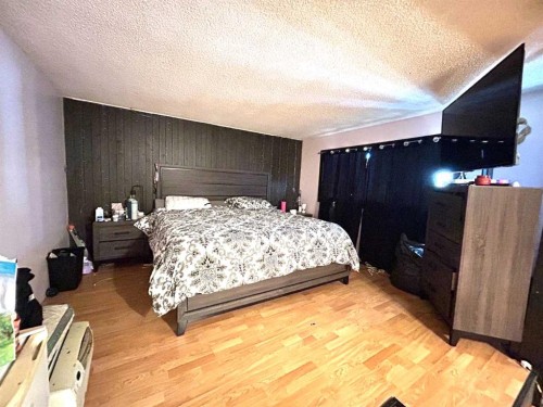 161 Ingram Park Drive East, Brooks, AB - Indoor Photo Showing Bedroom