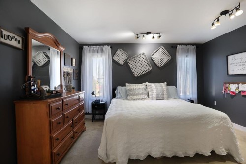 75 Parkland Close East, Brooks, AB - Indoor Photo Showing Bedroom