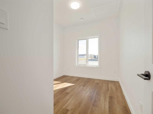 7046 48 Street, Taber, AB - Indoor Photo Showing Other Room