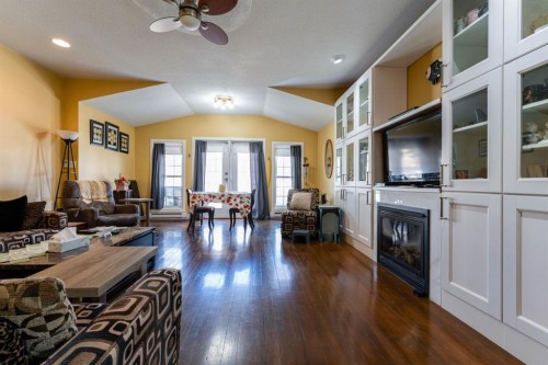 145 Centre Street, Drumheller, AB - Indoor Photo Showing Living Room With Fireplace
