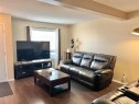 808 Birchwood Close, Drumheller, AB  - Indoor Photo Showing Living Room 