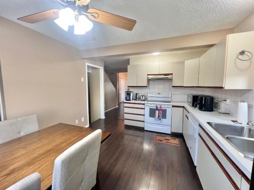 808 Birchwood Close, Drumheller, AB - Indoor Photo Showing Kitchen With Double Sink