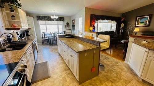 24 Willow Point, Drumheller, AB - Indoor Photo Showing Kitchen With Double Sink
