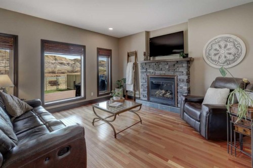 12 Willow Point, Drumheller, AB - Indoor Photo Showing Living Room With Fireplace