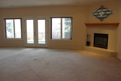 71 Park Place West, Brooks, AB - Indoor With Fireplace