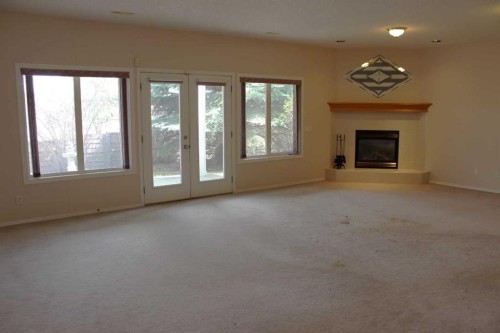71 Park Place West, Brooks, AB - Indoor With Fireplace