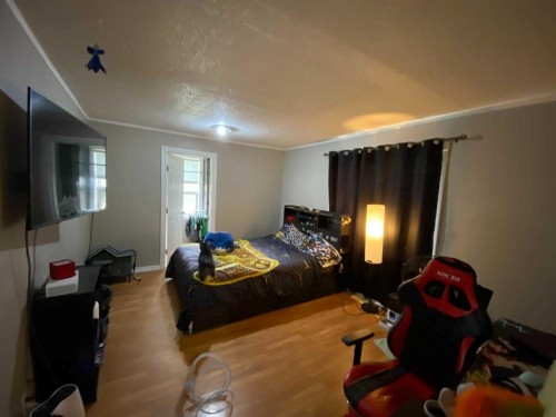 23 Pine Avenue West, Brooks, AB - Indoor Photo Showing Bedroom