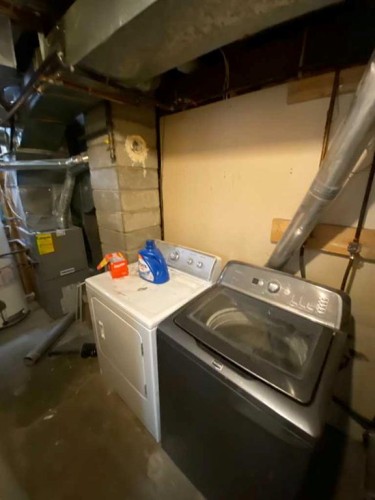 23 Pine Avenue West, Brooks, AB - Indoor Photo Showing Laundry Room