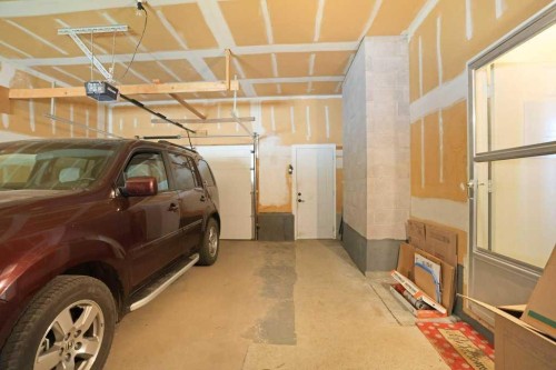 160 Ingram Park Drive, Brooks, AB - Indoor Photo Showing Garage