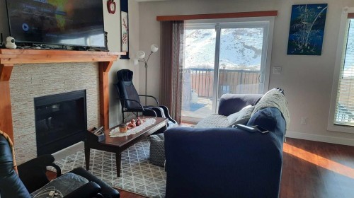 153 10 Avenue, Drumheller, AB - Indoor With Fireplace