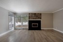 508 2 Avenue West, Brooks, AB  - Indoor Photo Showing Living Room With Fireplace 