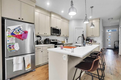 44 Seton Villas Se, Calgary, AB - Indoor Photo Showing Kitchen With Upgraded Kitchen