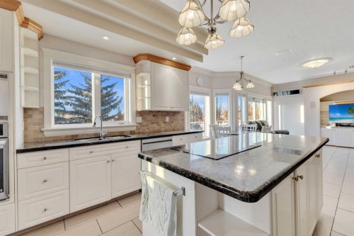25 Ashmore Close, Red Deer, AB - Indoor Photo Showing Kitchen With Upgraded Kitchen