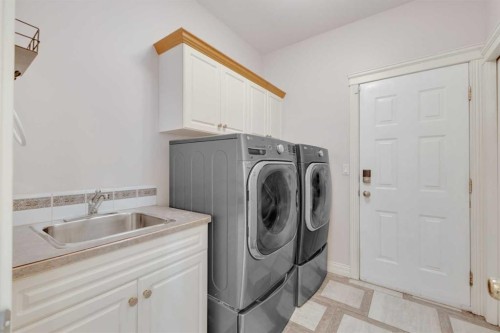 25 Ashmore Close, Red Deer, AB - Indoor Photo Showing Laundry Room