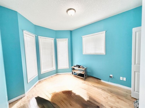 42 A Red Deer Avenue, Drumheller, AB - Indoor Photo Showing Bedroom