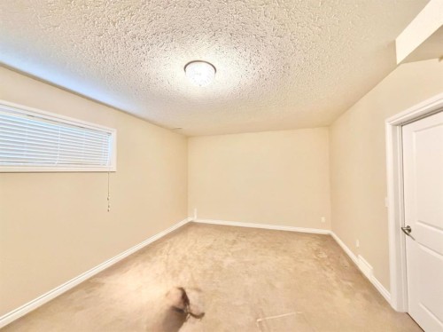 42 A Red Deer Avenue, Drumheller, AB - Indoor Photo Showing Other Room