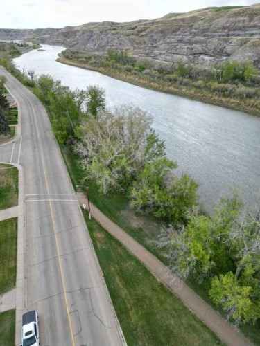 809 Riverside Drive East, Drumheller, AB - Outdoor With Body Of Water With View