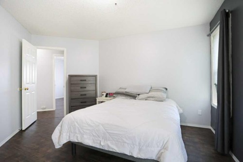 68 Upland Street, Brooks, AB - Indoor Photo Showing Bedroom
