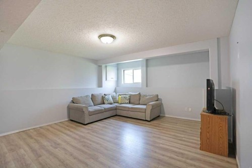 68 Upland Street, Brooks, AB - Indoor Photo Showing Living Room