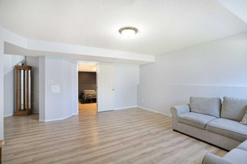 68 Upland Street, Brooks, AB - Indoor Photo Showing Living Room