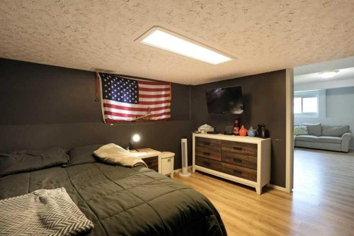 68 Upland Street, Brooks, AB - Indoor Photo Showing Bedroom