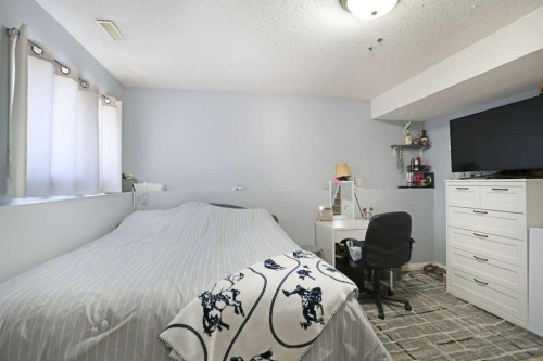 68 Upland Street, Brooks, AB - Indoor Photo Showing Bedroom