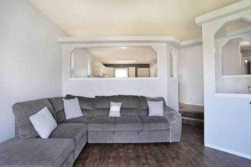 68 Upland Street, Brooks, AB - Indoor Photo Showing Living Room
