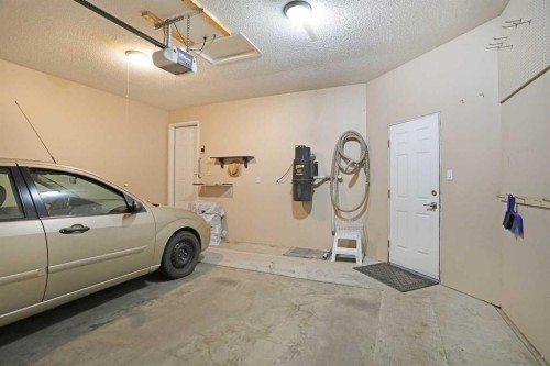63 Lu-Dor Close East, Brooks, AB - Indoor Photo Showing Garage