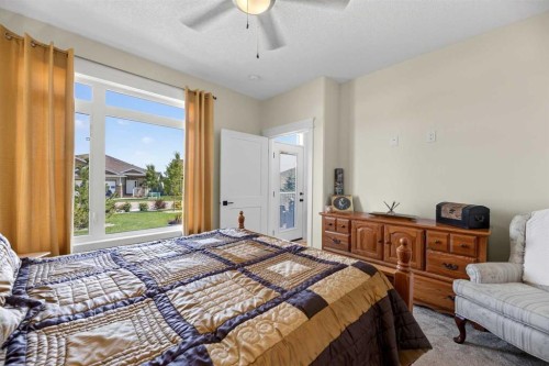 1109 Cornerstone Crescent, Olds, AB - Indoor Photo Showing Bedroom
