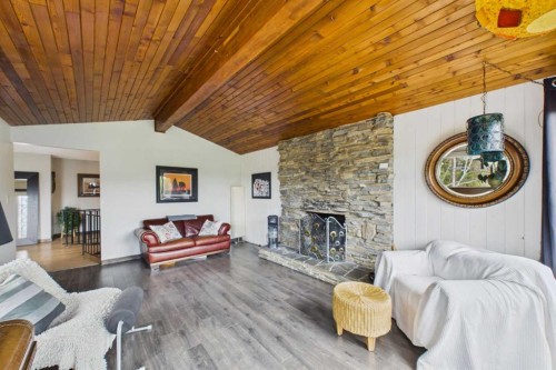 10-2168 587 Highway, Bowden, AB - Indoor Photo Showing Living Room With Fireplace