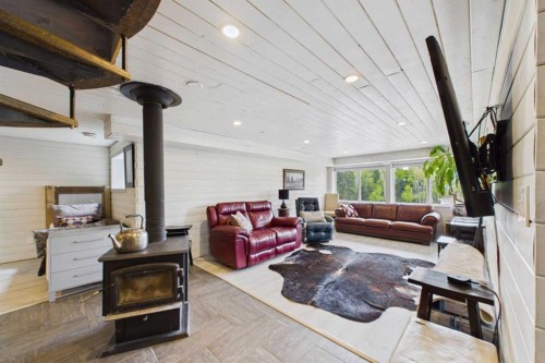 10-2168 587 Highway, Bowden, AB - Indoor With Fireplace