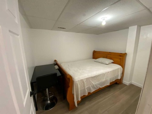 1708 2 Avenue East, Brooks, AB - Indoor Photo Showing Bedroom
