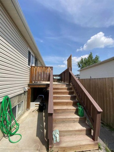 1708 2 Avenue East, Brooks, AB - Outdoor With Deck Patio Veranda With Exterior