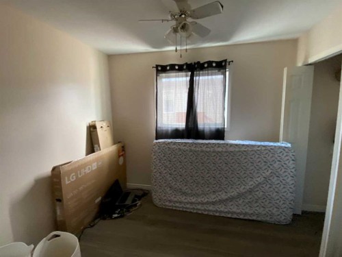 1708 2 Avenue East, Brooks, AB - Indoor Photo Showing Bedroom