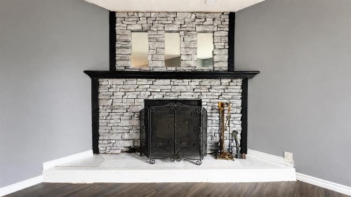 137 Big Hill Place, Airdrie, AB - Indoor With Fireplace