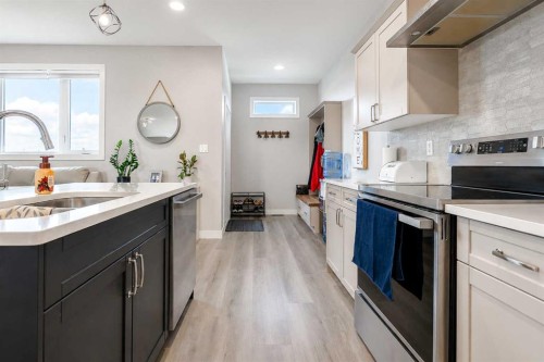 1614 2 Avenue East, Brooks, AB - Indoor Photo Showing Kitchen With Double Sink