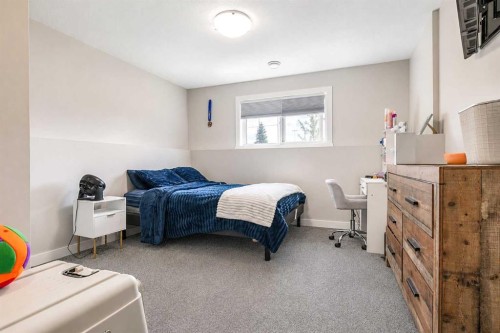 1614 2 Avenue East, Brooks, AB - Indoor Photo Showing Bedroom