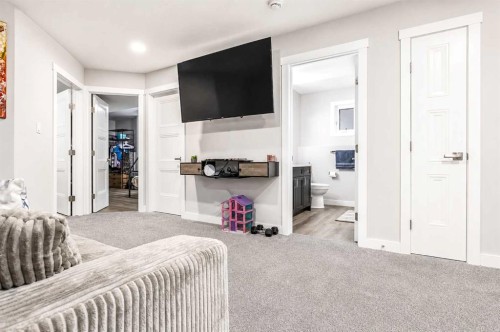 1614 2 Avenue East, Brooks, AB - Indoor Photo Showing Bedroom