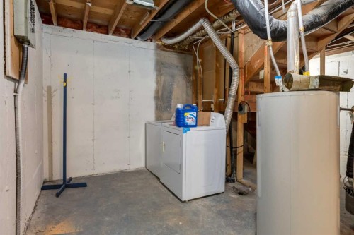 4627 73 Street Nw, Calgary, AB - Indoor Photo Showing Laundry Room