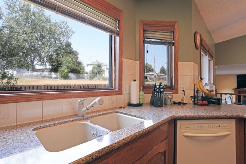 35 Parkland Close East, Brooks, AB - Indoor Photo Showing Kitchen With Double Sink
