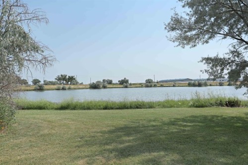 35 Parkland Close East, Brooks, AB - Outdoor With Body Of Water With View