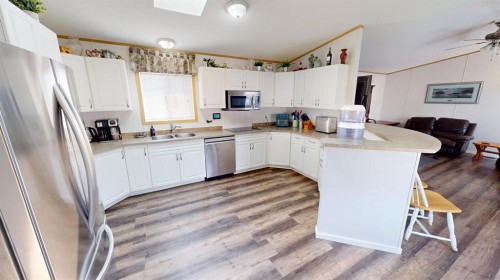 92 Railway Avenue, Rosemary, AB - Indoor Photo Showing Kitchen With Double Sink