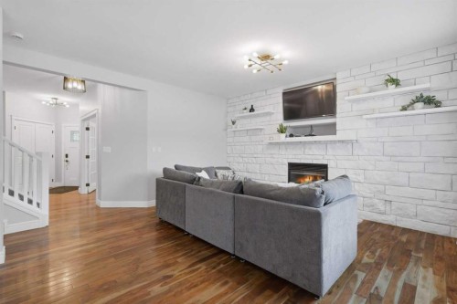 113 Weddell Crescent, Red Deer, AB - Indoor Photo Showing Living Room With Fireplace