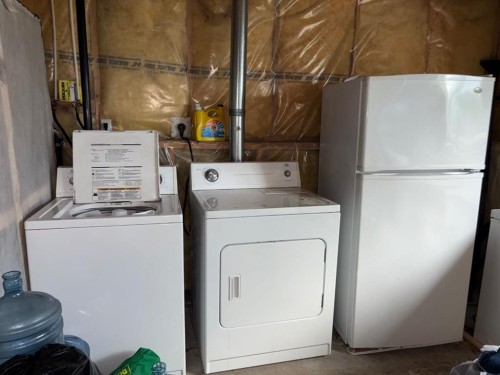66 Upland Road West, Brooks, AB - Indoor Photo Showing Laundry Room