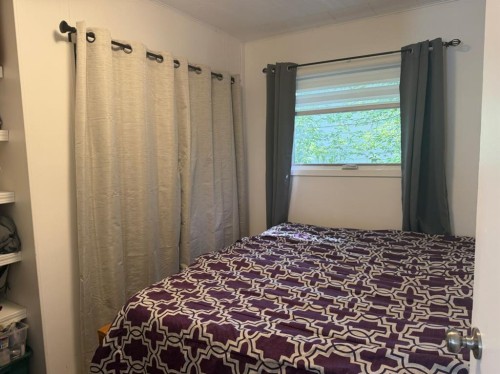 97 Villa Street, Drumheller, AB - Indoor Photo Showing Bedroom