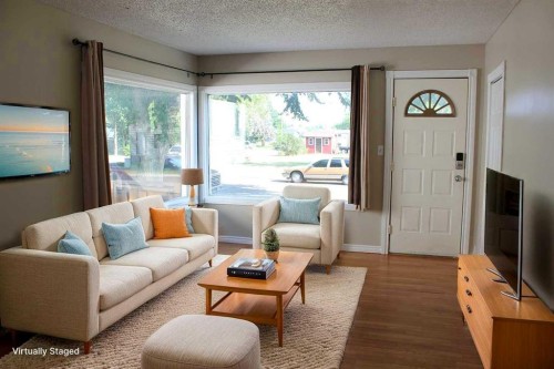 23 Pine Avenue West, Brooks, AB - Indoor Photo Showing Living Room